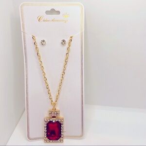 Necklace Crystal In Red. Shape of Perfume Bottle with Earrings and Golden chain.